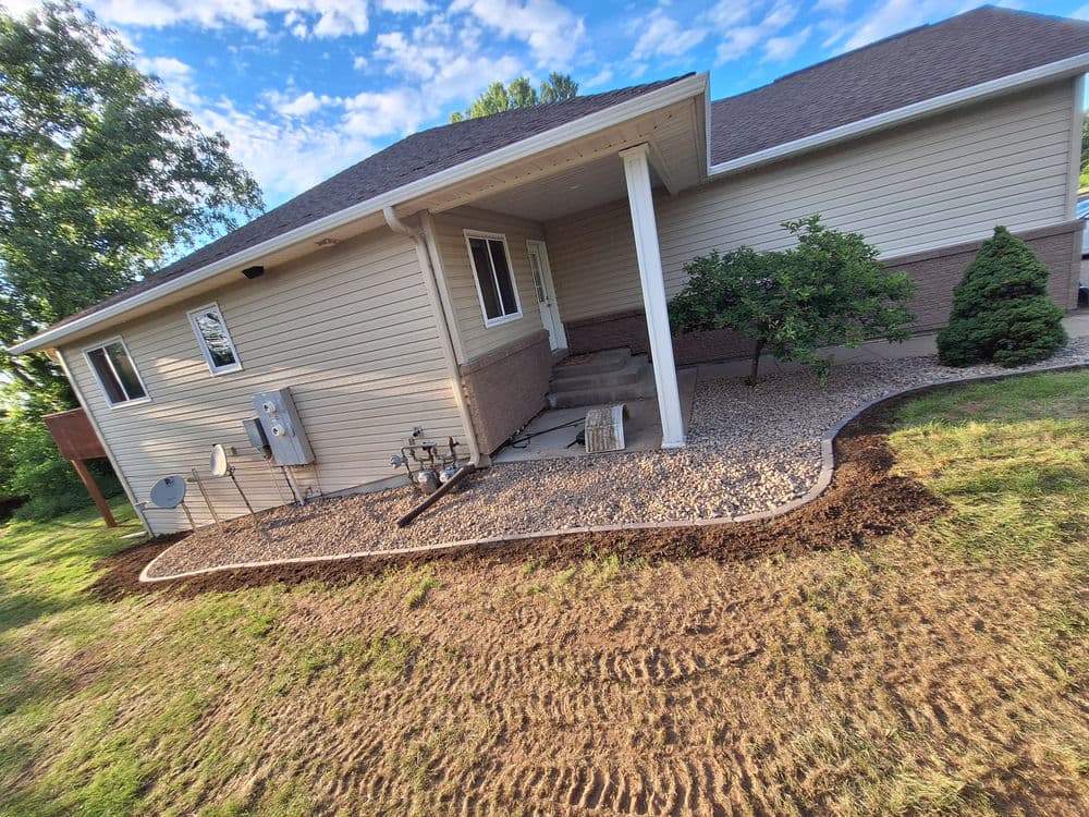 Gallery photos for Concrete Landscape Edging and Rock Bed Installation in Fall Creek: Image #1