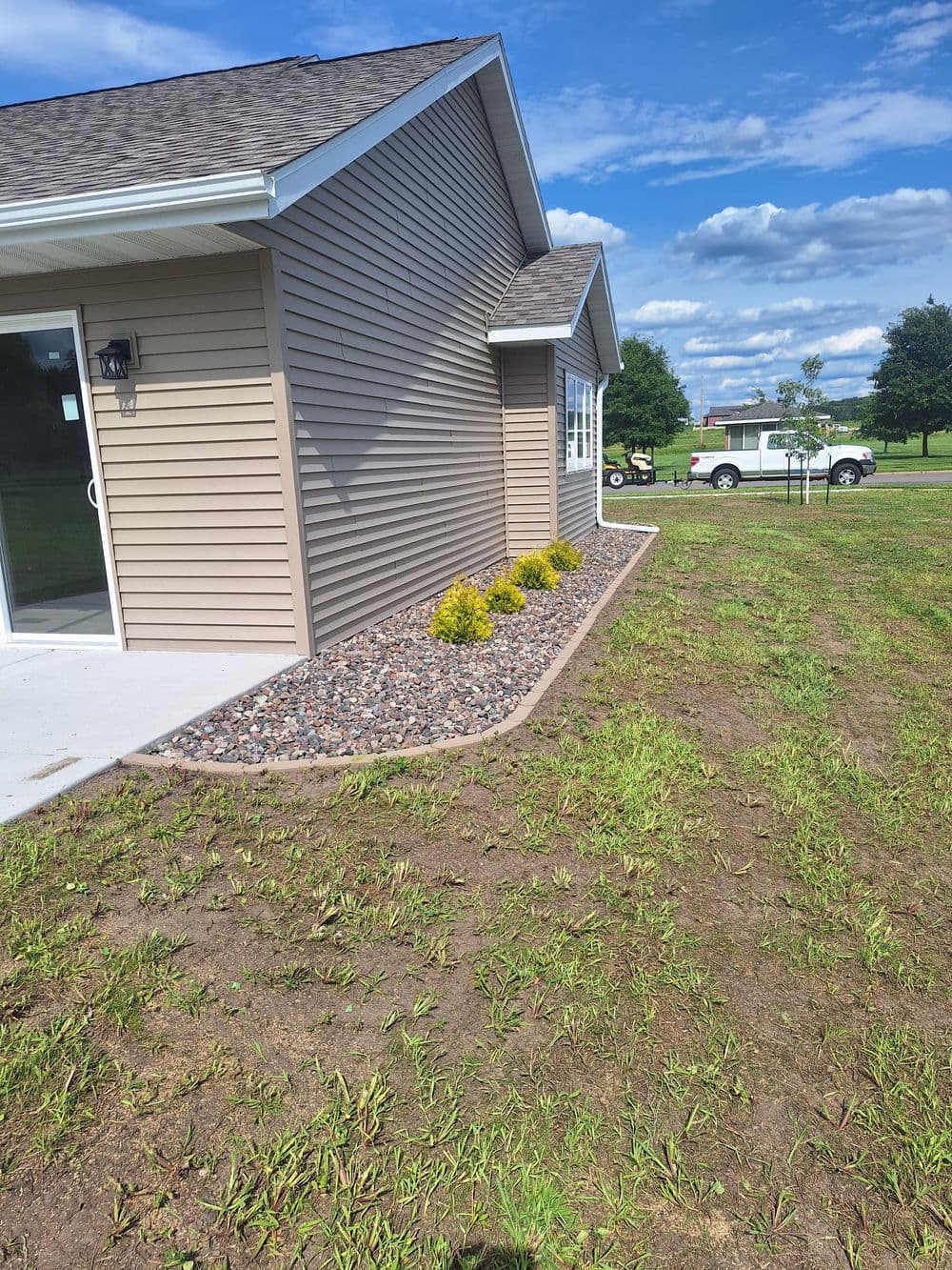 Gallery photos for Concrete Landscape Edging and Rock Bed Installation in Fall Creek: Image #3